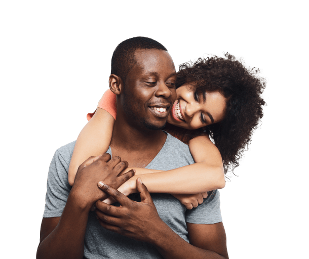 Portrait of a man with a woman hugging him from behind