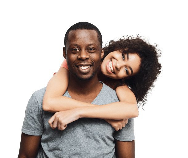 Portrait of a man with a woman hugging him from behind