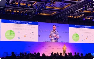 Sergey speaking at conference photo