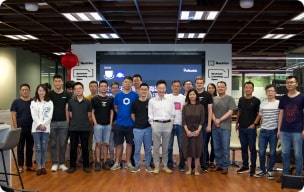 Community members posing during a Chainlink event photo
