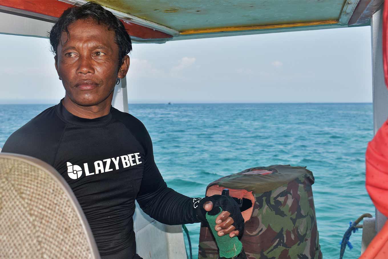 Former shark fisherman Suhardi taking snorkelling trips.