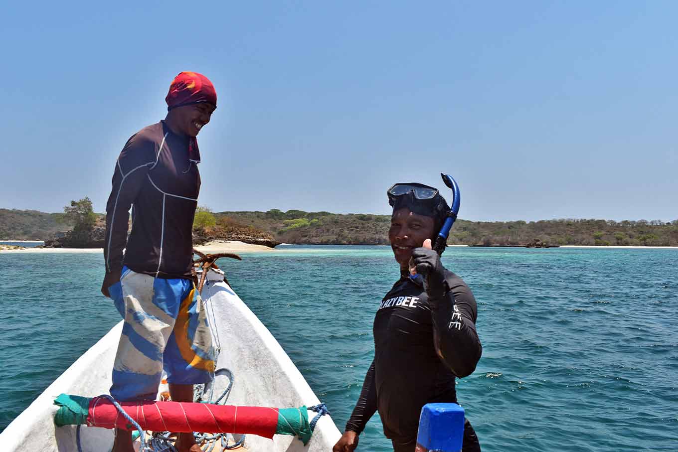 Suhardi and his crew member happy with their new way of life.
