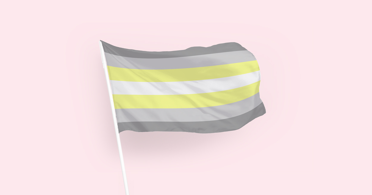 A flag waves in the air with a design of horizontal stripes in the colors of the demigender pride flag, from top to bottom: Dark gray, light gray, yellow, white, yellow, light gray, dark gray