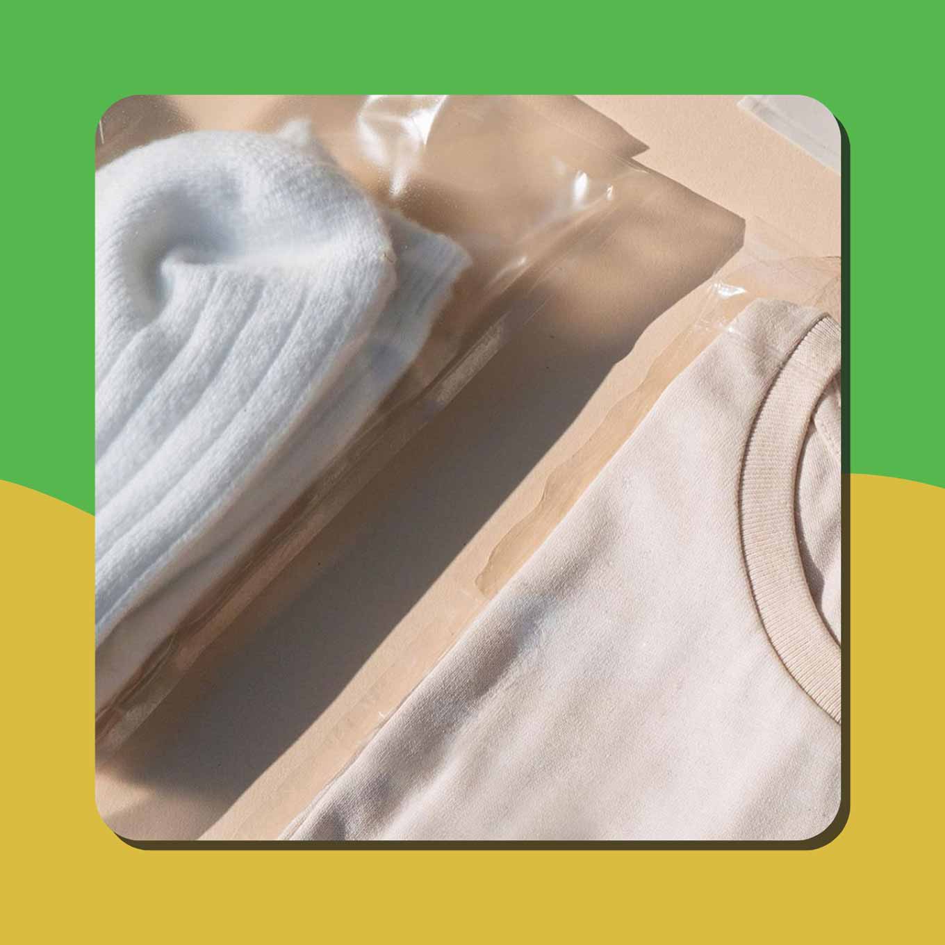 A cream t-shirt and a pair of white socks in clear Sway seaweed packaging