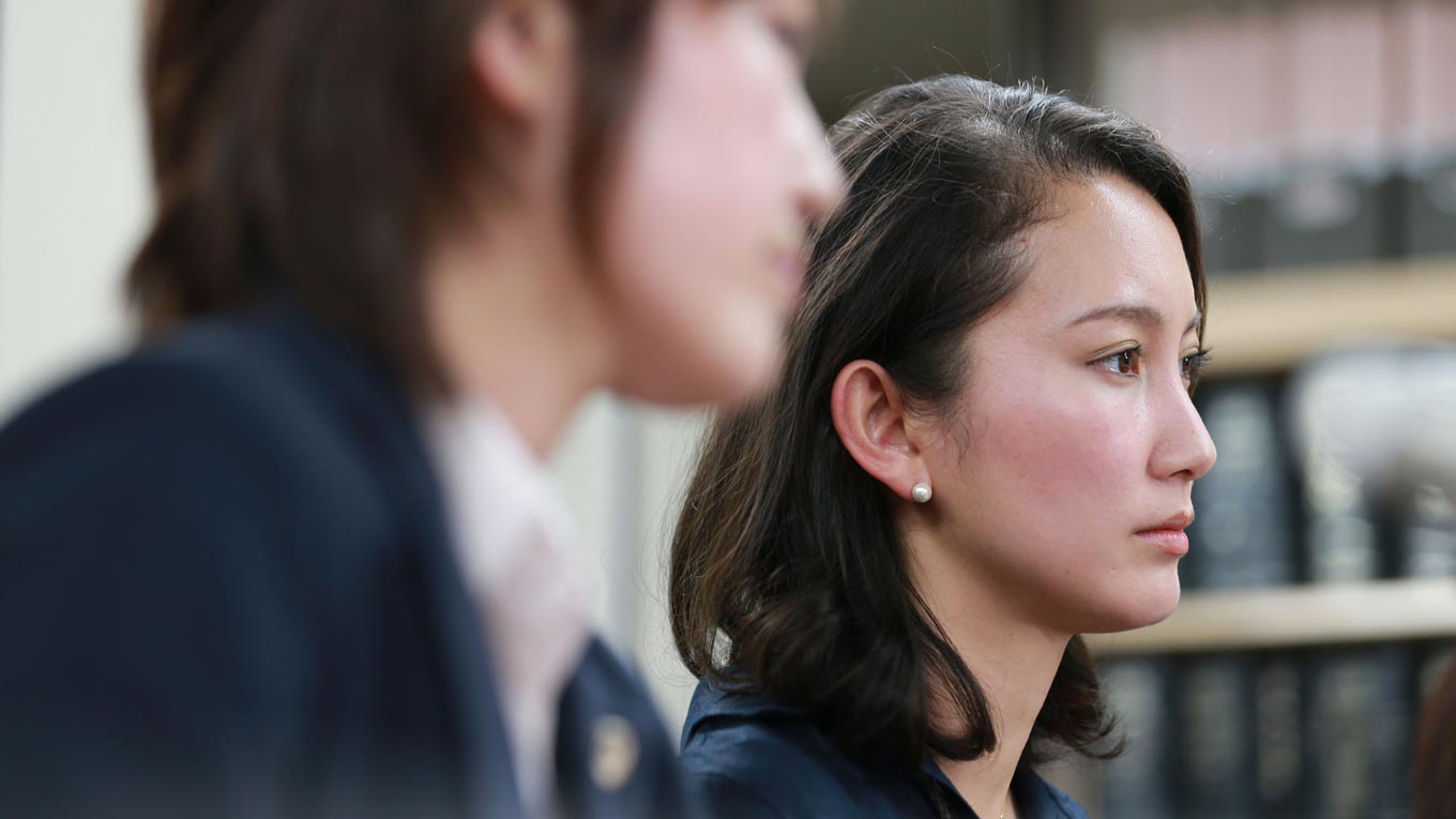 A still from "Black Box Diaries" showing a side profile of Shiori Ito