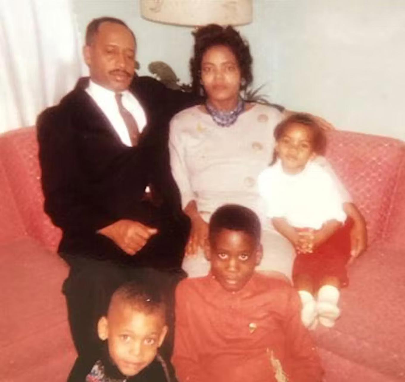 Jessie Dean Gipson Simmons, shown top center, posing for the camera with her family.  [Clockwise: daughter Angela, sons Obadiah Jerone, Jr. and Carl, and husband Obadiah Jerone, Sr.]