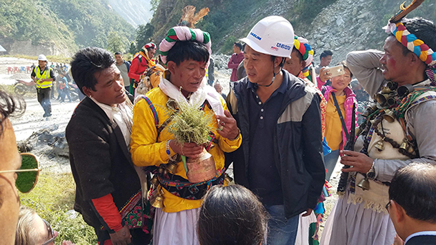 An Indigenous Peoples prayer ceremony at Nepal's UT-1 hydropower project