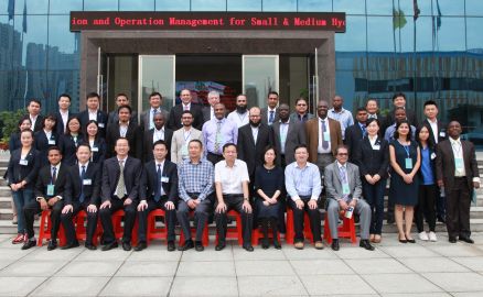 Photograph of workshop participants outside HNAC Technology Co. Ltd's International Technology Exchange Center