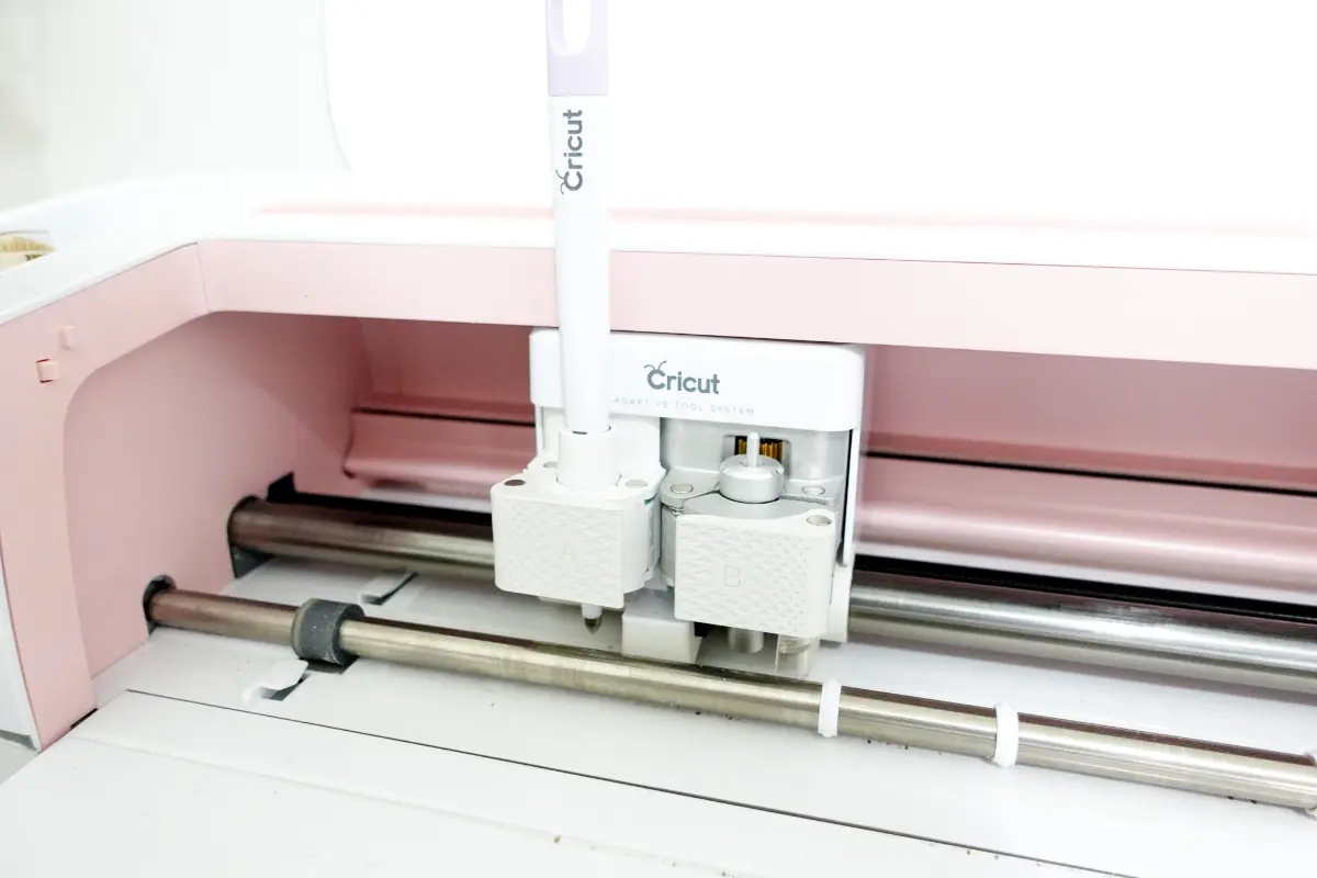 A Cricut Maker in pink.