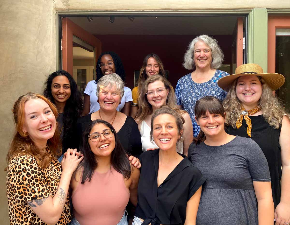 Merrill, Coeytaux and Wells of Plan C meeting around a table