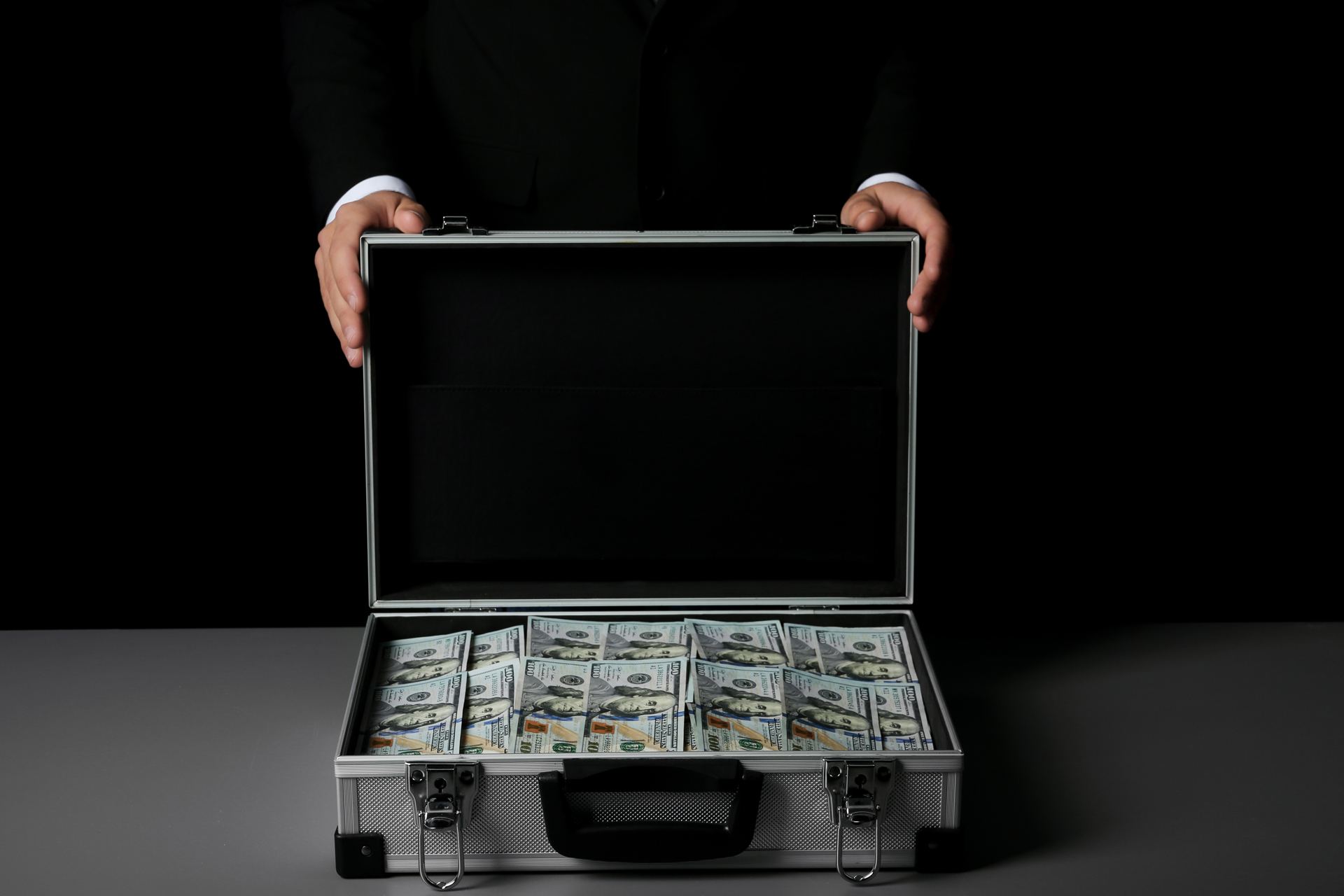 Picture of a suitcase full of cash