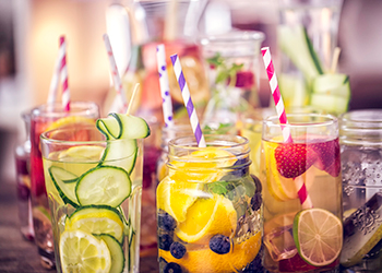 Glasses of water with added fruit