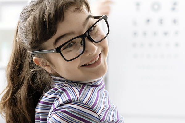 Girl with black prescription glasses