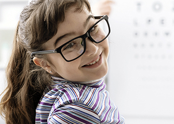 Girl with black prescription glasses