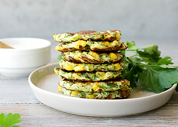 Stack of haloumi fritters on a plate