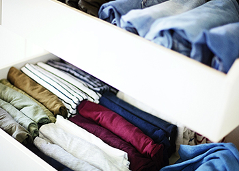 Neatly organised clothes in drawers