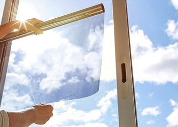 Person holding solar film