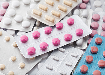 Blister packs of different coloured medications