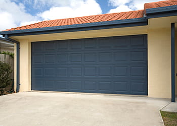 House with a dark grey garage door
