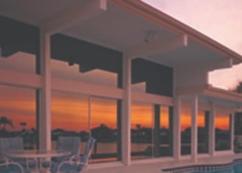 House exterior with tinted windows - Window Tinting