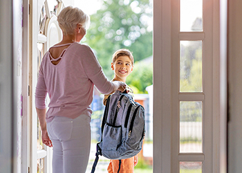 Parent and child leaving for school