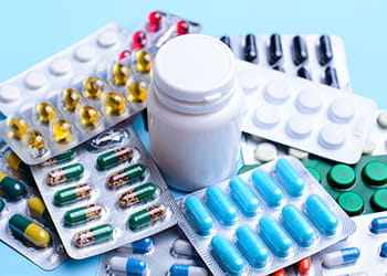 various packs of tablets and medication