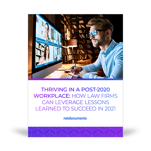 Graphic for the Whitepaper discussing law firms post-2020 world; a man sits at a computer desk smiling while working