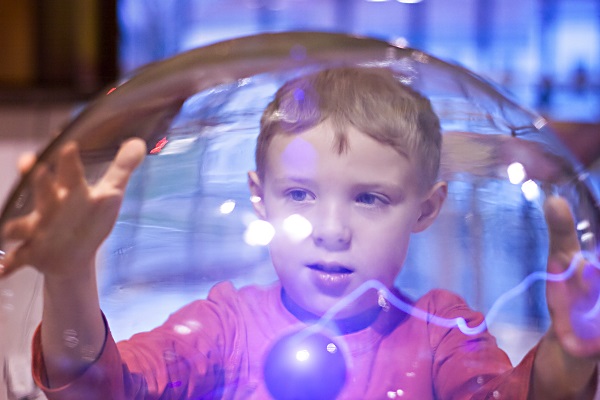 Child With Tesla Ball