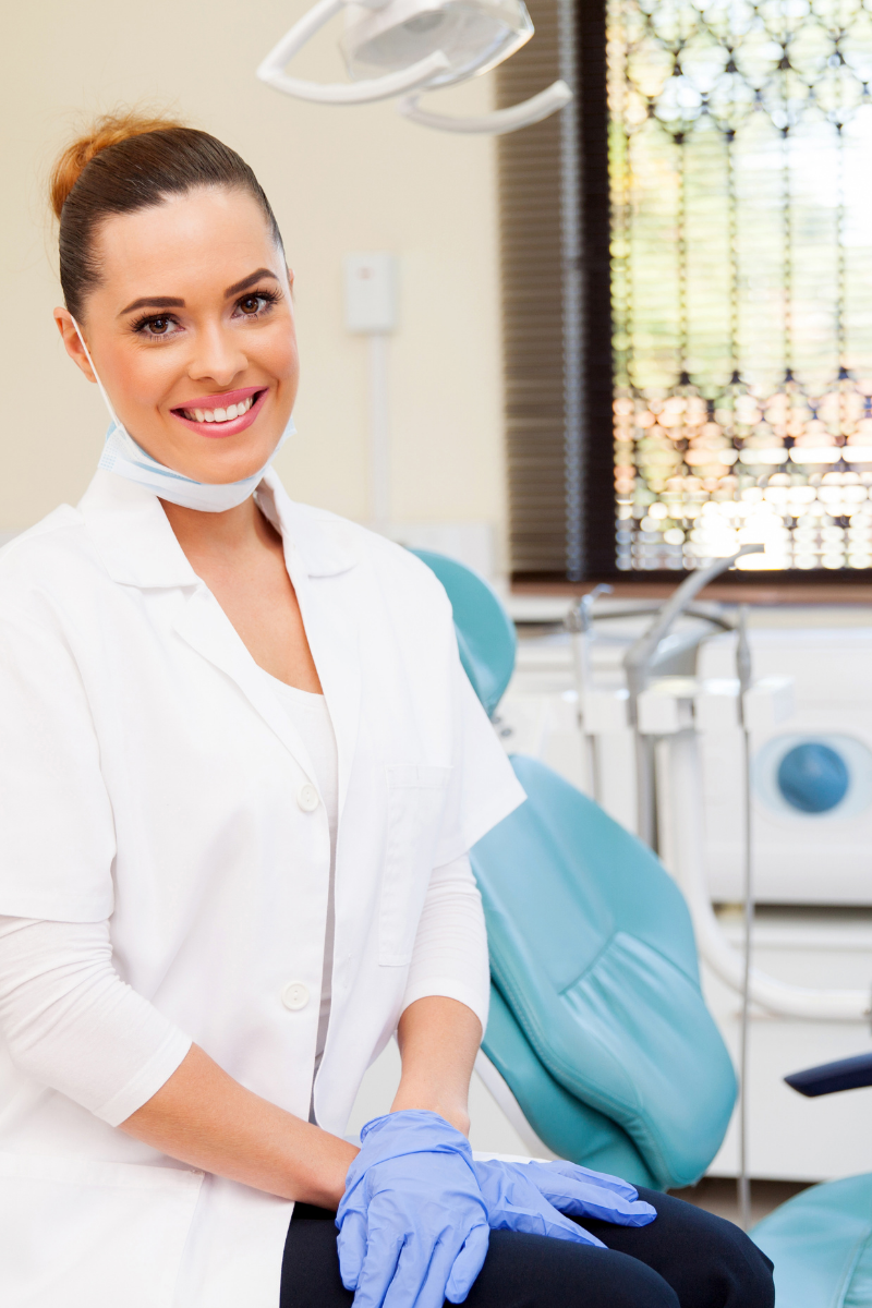 female-dentist-smiling-operatory