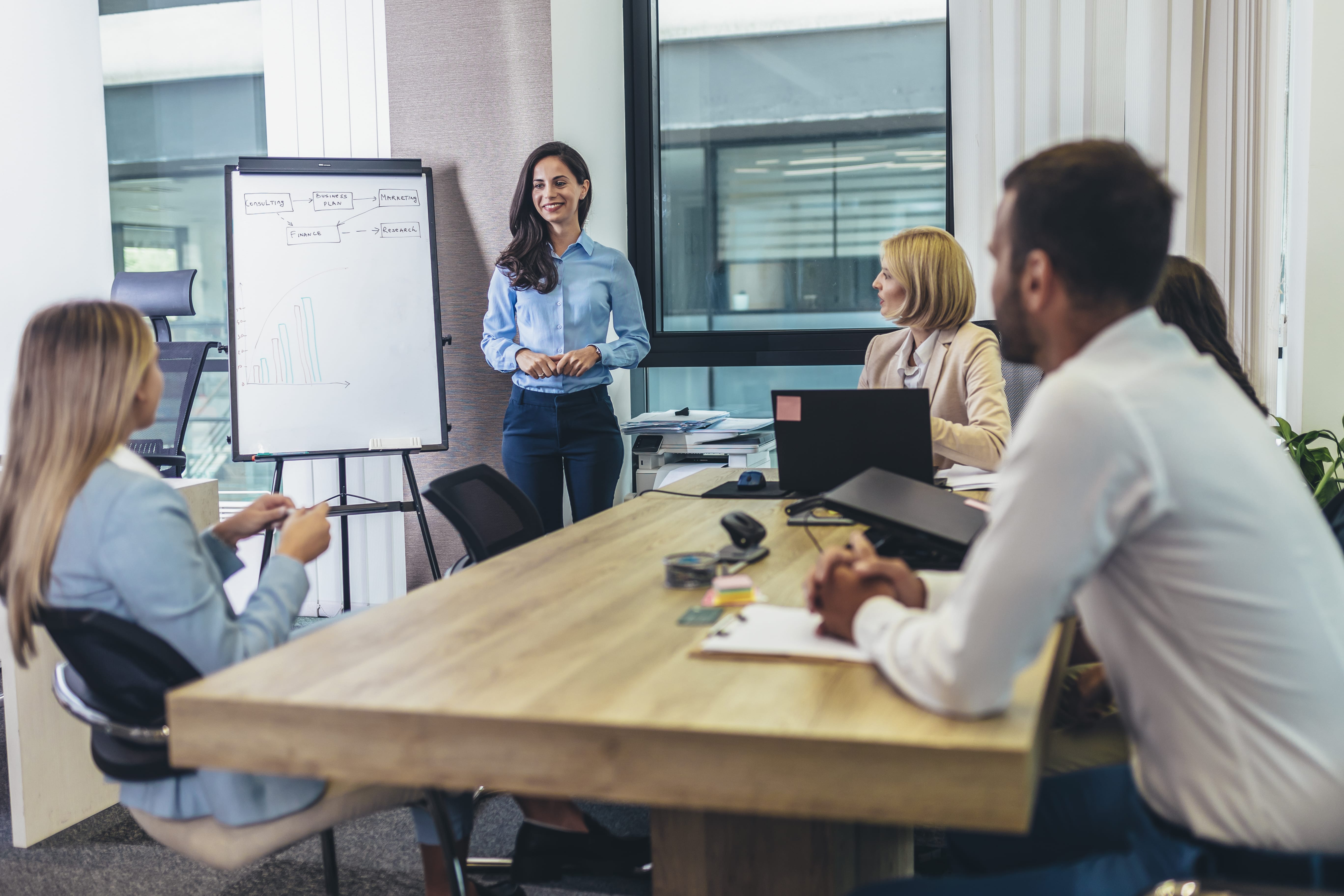 A businesswoman giving a presentation in the office