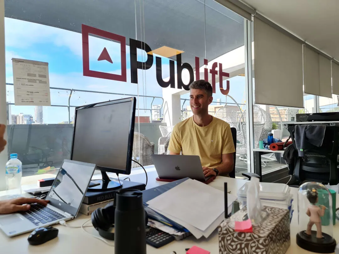 Publift CEO Colm at his desk in the office