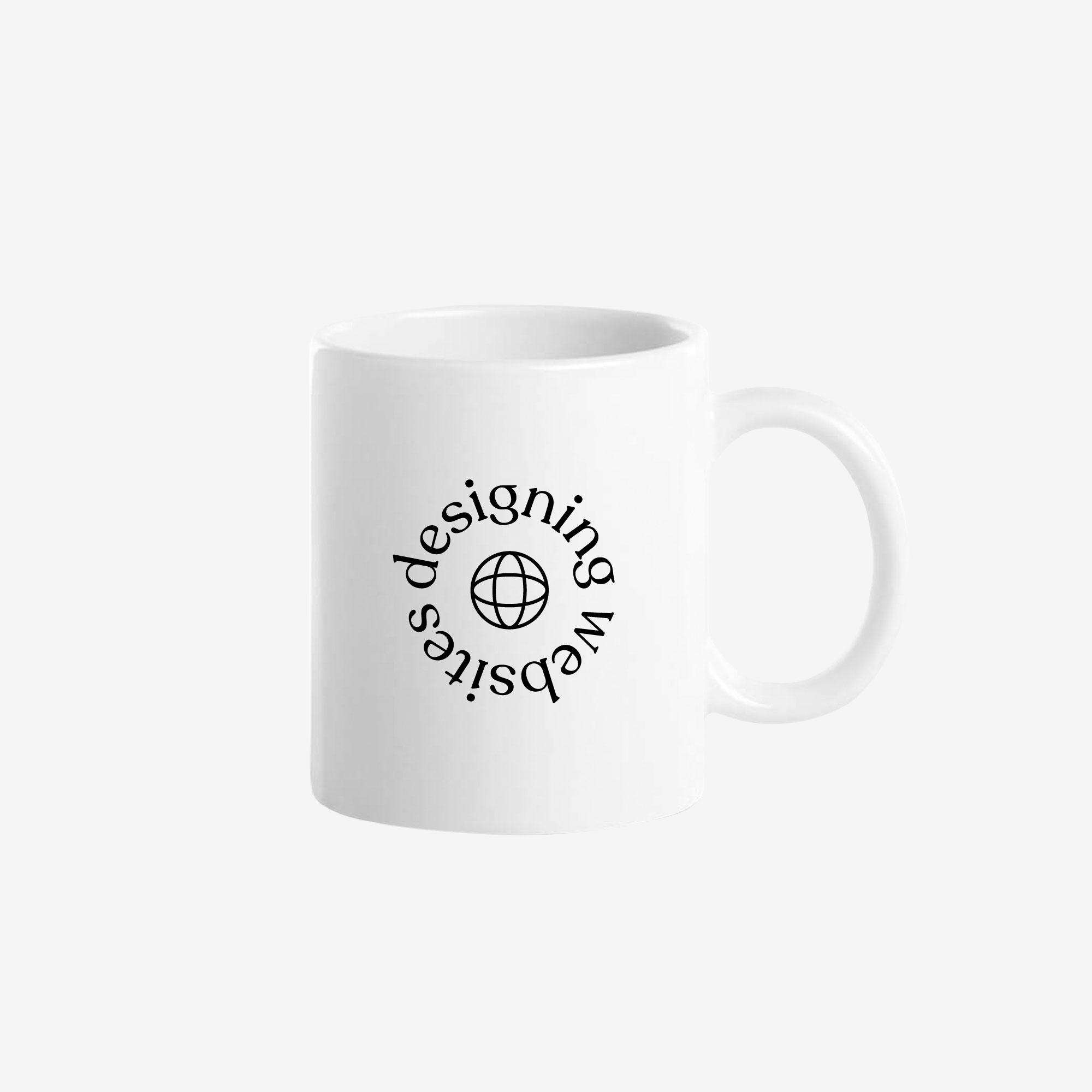 A white ceramic coffee mug with a circular text design saying "designing websites" around a minimal globe line illustration.