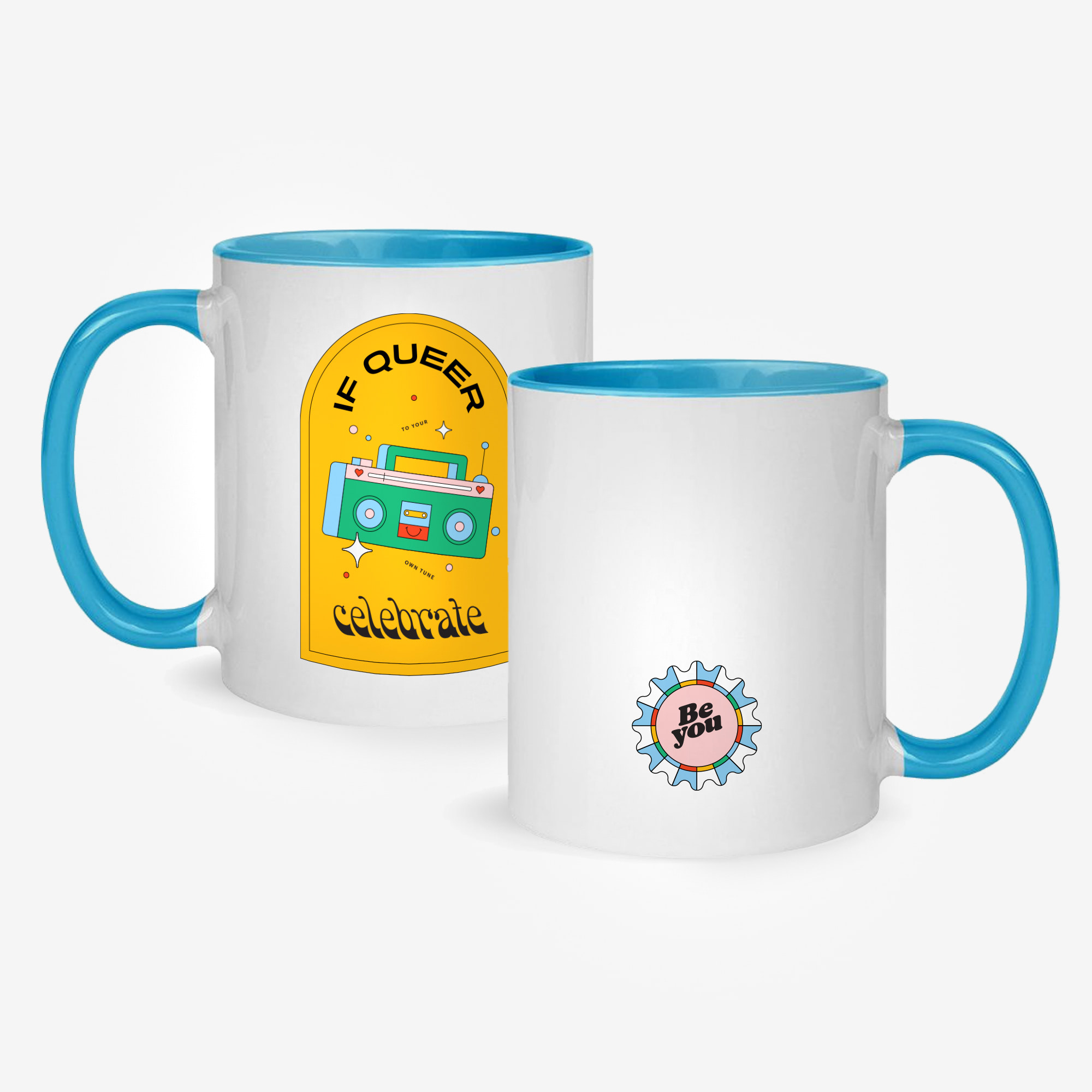 This ceramic mug features a yellow “if queer, celebrate” graphic on one side, with a small pink “be you” graphic on the other. The rim, handle, and inside of this mug is blue while the rest is white.