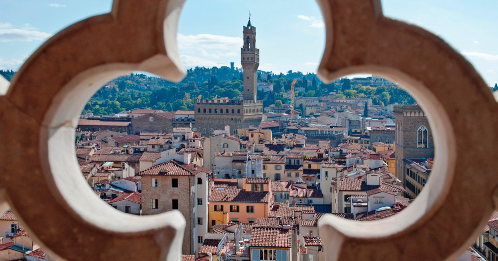 A view of Florence through an open sculpture.