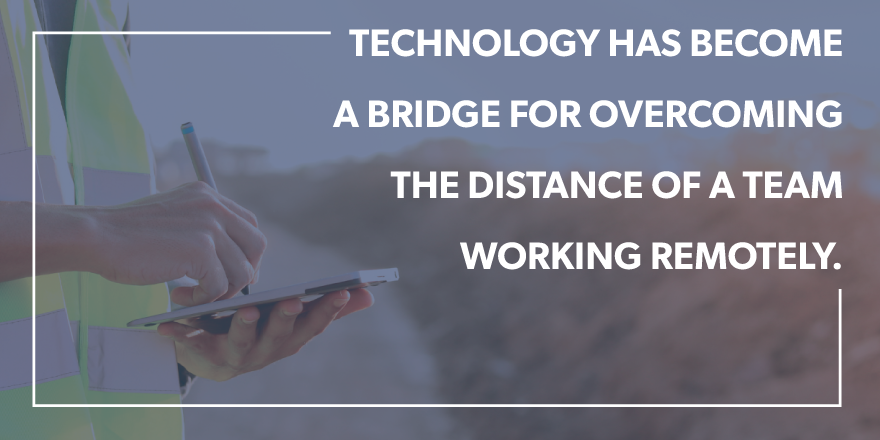 A man in a reflective vest writing on a tablet with the quote "technology has become a bridger for overcoming the distance of a team working remotely."