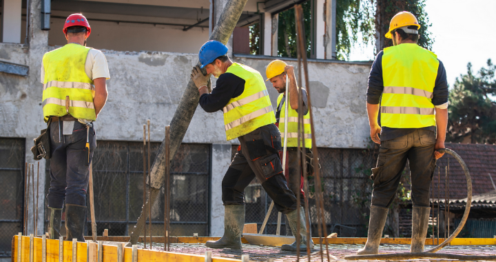 Construction workforce building on a project site.