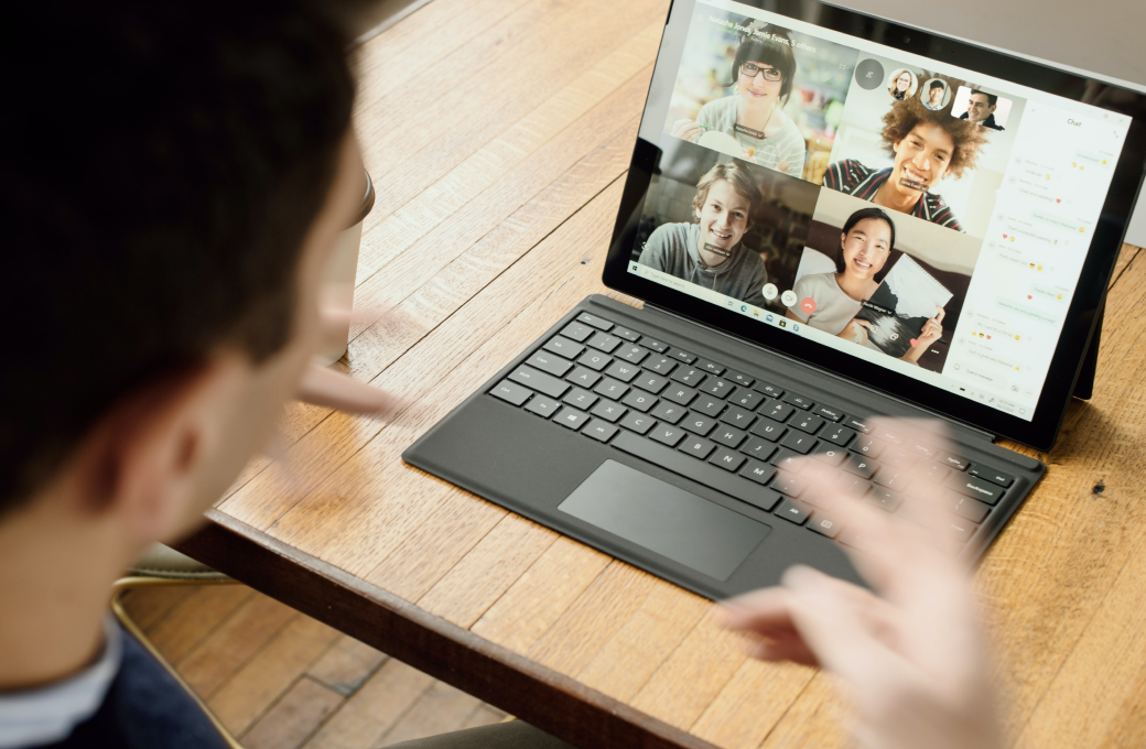 Aerial view of man on a Zoom call on his laptop