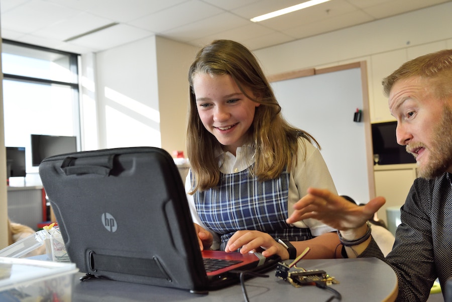 tutor with smiling student