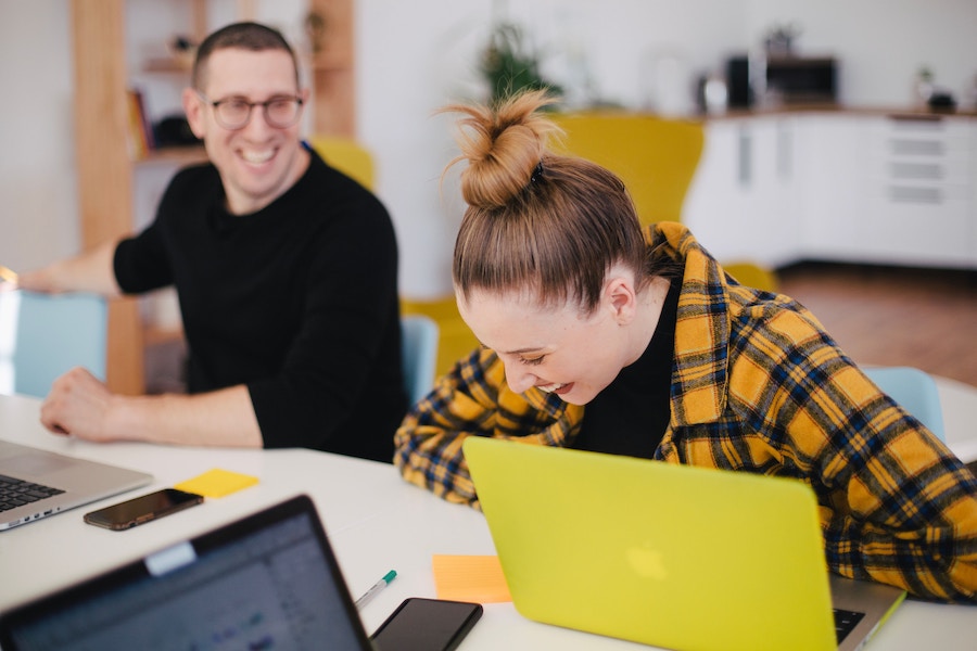 student laughing and learning