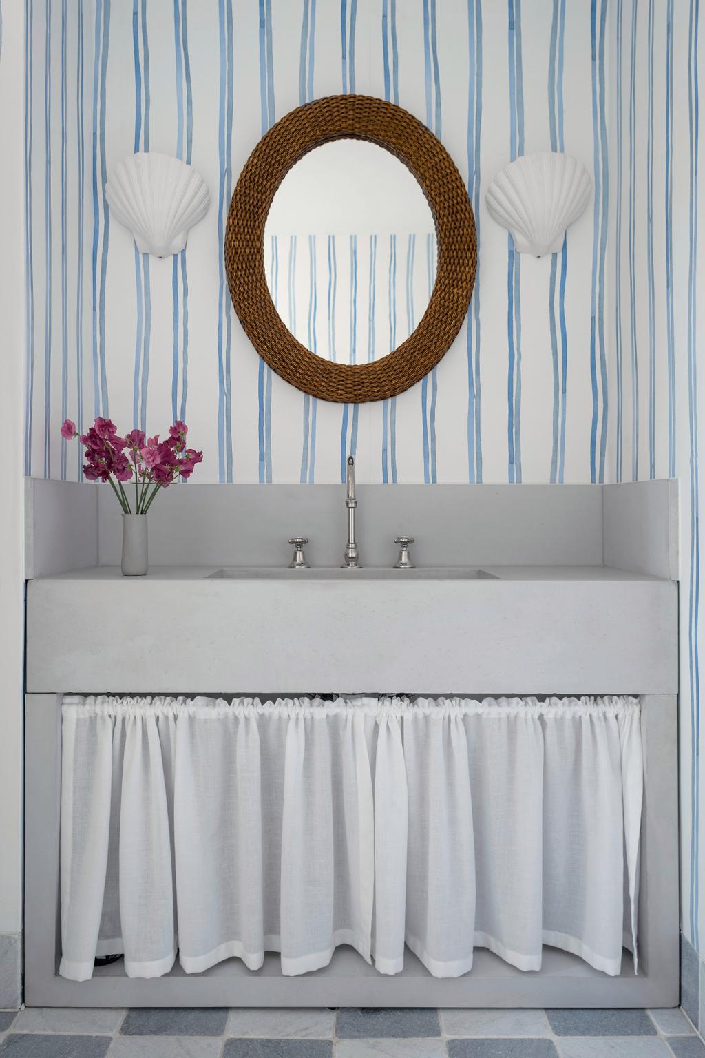 Tamsin Johnson Interior Design Wallpaper in bathroom with concrete vanity and wall lights