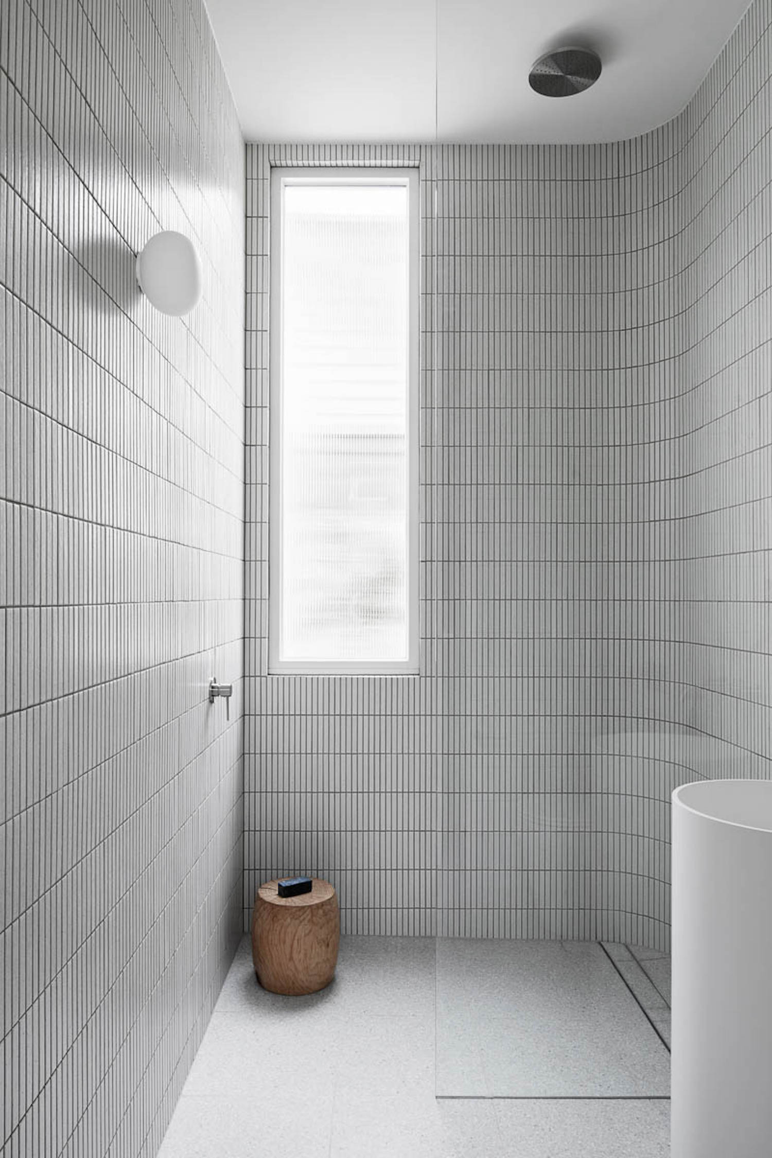 White bathroom with special grout modern bathroom