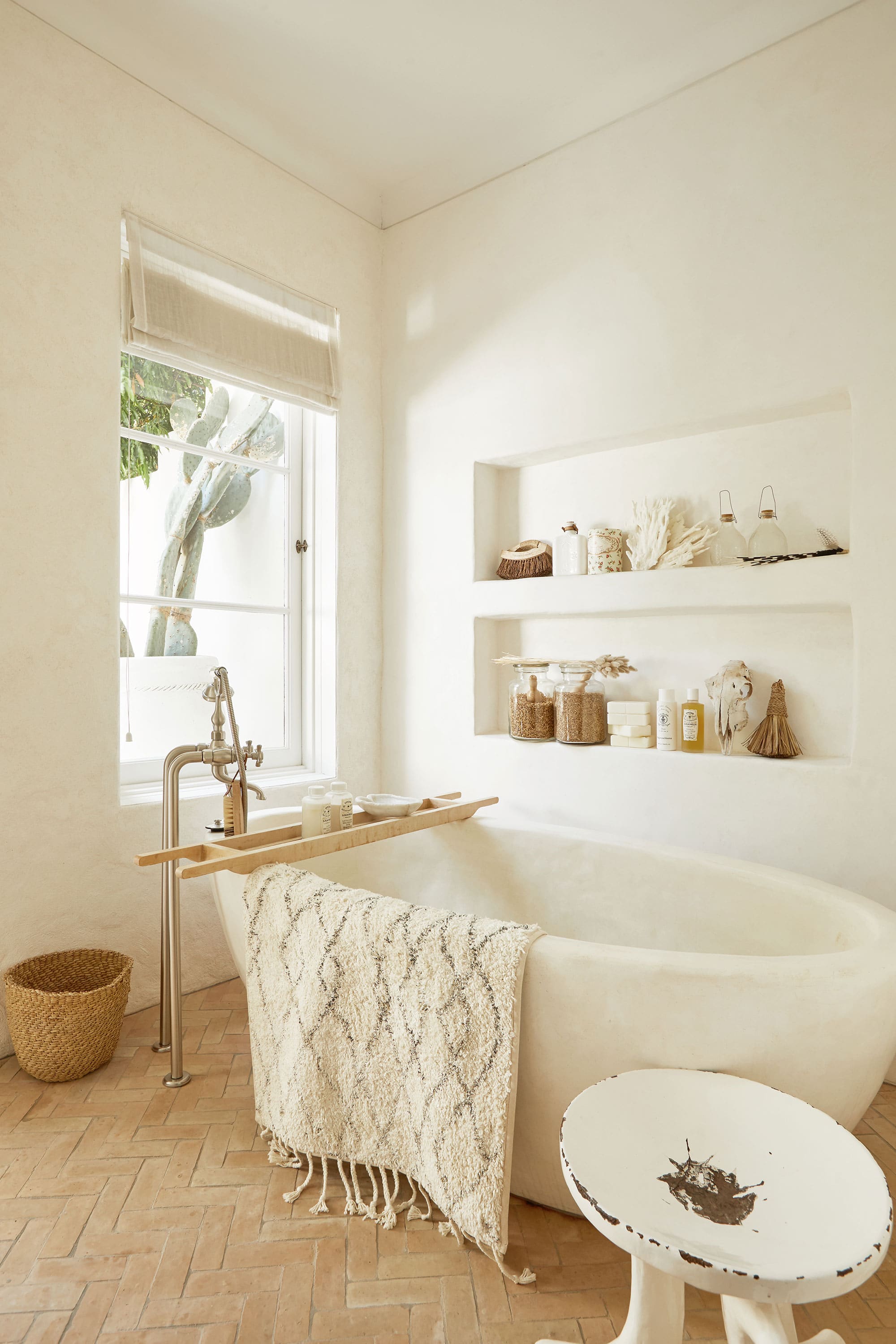 Romi Weinberg Bathroom coastal interiors with storage solution for bathroom