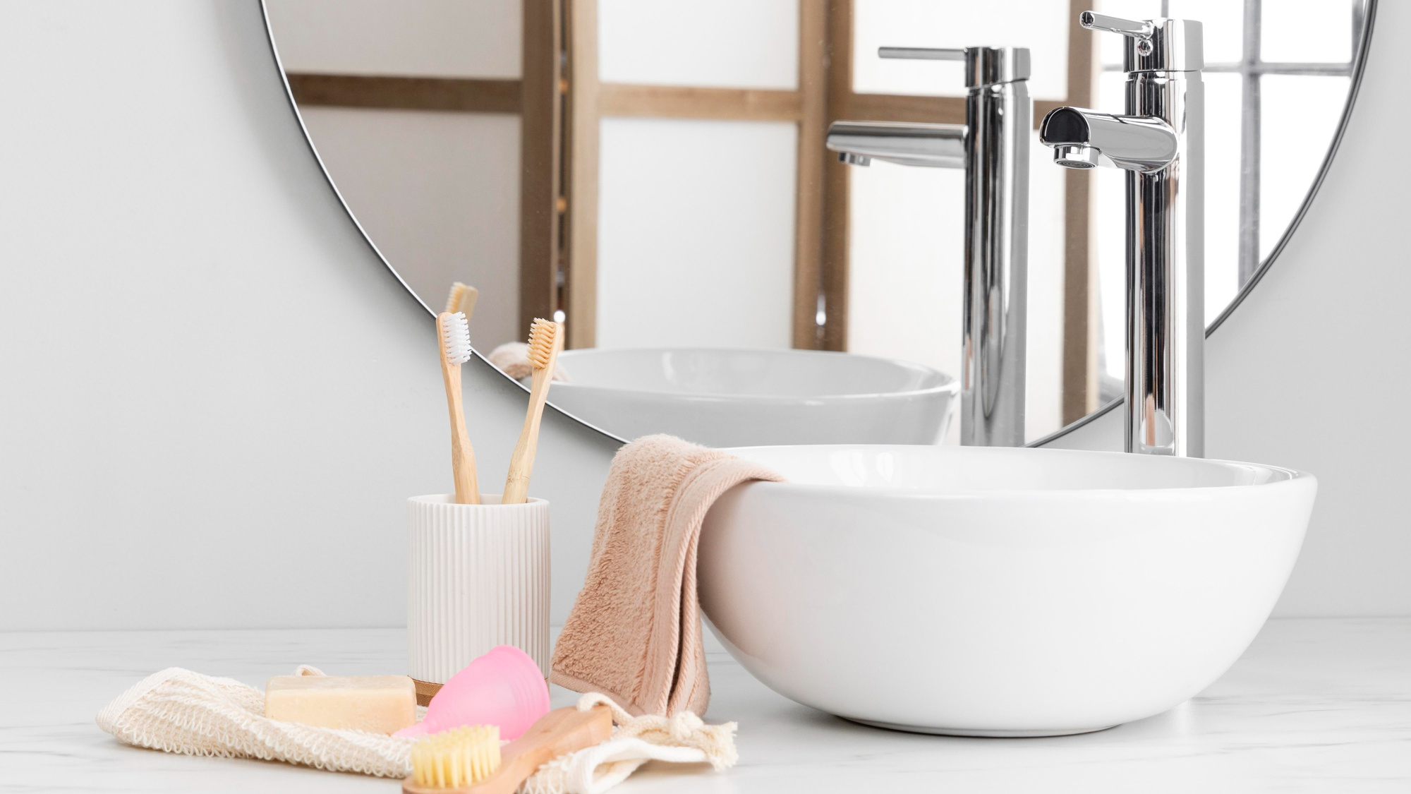 Bathroom sink and countertop with natural self-care products