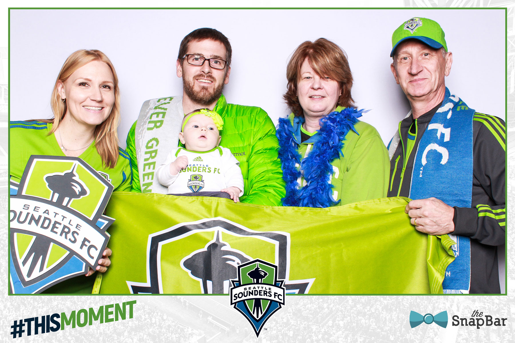 Baby in photo booth Sounders
