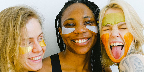 Photo of women doing their skincare