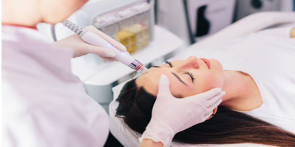 Girl receiving Hydrafacial
