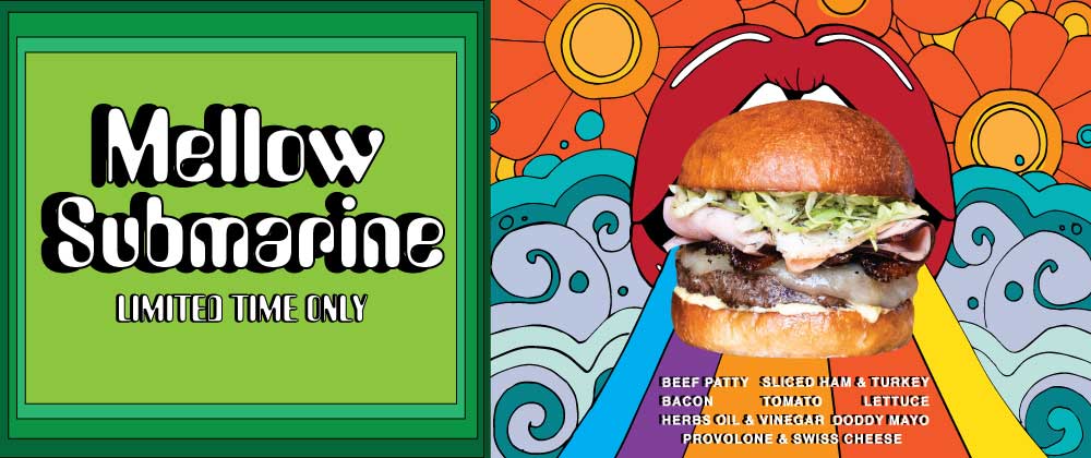 Mellow Submarine. Limited Time Only. Certified Piedmontese Beef Patty topped with sliced ham & turkey, provolone & swiss cheese, bacon, LTO, oil & vinegar, doddy mayo and herbs, sliced onion.