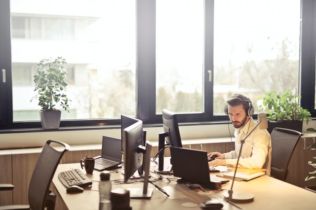 customer support employee at desk
