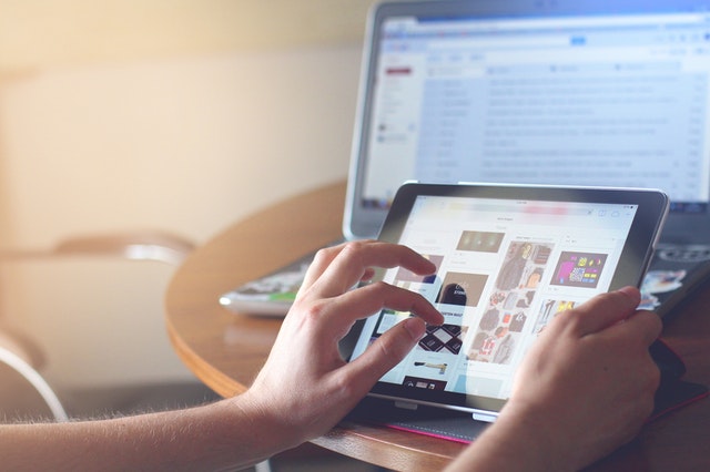 person online shopping on tablet