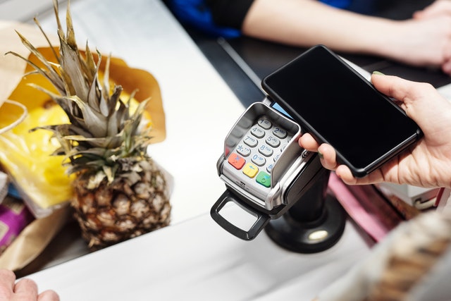 person making mobile payment
